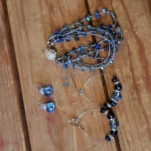 One bracelet and two sets of earrings